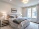 Bedroom with a large window, carpet, and neutral decor at 2637 Sidford Aly, Raleigh, NC 27608