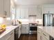 Modern kitchen featuring stainless steel appliances, sleek countertops, and ample cabinet space for culinary enthusiasts at 2637 Sidford Aly, Raleigh, NC 27608