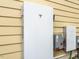 Exterior wall with Tesla battery and electric components installed at 2637 Sidford Aly, Raleigh, NC 27608