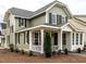 Charming home showcasing an inviting porch, complemented by mature landscaping for enhanced curb appeal at 2641 Sidford Aly, Raleigh, NC 27608