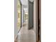 Bright hallway with polished concrete floors, featuring modern doorways and abundant light at 295 Lystra Preserve Dr, Chapel Hill, NC 27517