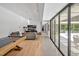 Spacious open living space with a pool table and expansive windows to the exterior at 295 Lystra Preserve Dr, Chapel Hill, NC 27517