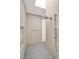 Luxurious shower with modern fixtures and beige tiling, illuminated by a skylight at 295 Lystra Preserve Dr, Chapel Hill, NC 27517