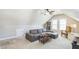 Finished bonus room with cozy seating, ceiling fan and natural light at 30155 Pharr, Chapel Hill, NC 27517