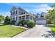 Charming two-story home with landscaped yard, covered porch, and attached garage at 30155 Pharr, Chapel Hill, NC 27517