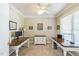 Bright home office featuring two desks, storage and neutral walls at 30155 Pharr, Chapel Hill, NC 27517