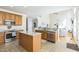 Spacious kitchen with stainless steel appliances, granite countertops, and an eat-in island at 30155 Pharr, Chapel Hill, NC 27517