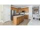 Well-equipped kitchen with an island, stainless steel appliances, and ample cabinet space at 30155 Pharr, Chapel Hill, NC 27517