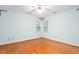 Bedroom with leafy wallpaper and hardwood floors at 3027 Truitt Dr, Burlington, NC 27215