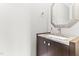 Close-up of the powder room showcasing the vanity, mirror, sink, and fixtures at 305 Georgetown Rd, Raleigh, NC 27608