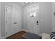 This entryway features a front door, closet, and hardwood flooring at 33 Davidson St, Clayton, NC 27527