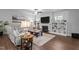 Bright living room with hardwood floors, a fireplace, and tastefully arranged decor at 33 Davidson St, Clayton, NC 27527