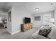This living room features a TV and a seating area at 33 Davidson St, Clayton, NC 27527