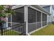 Spacious screened porch offers a tranquil outdoor living space with privacy at 33 Davidson St, Clayton, NC 27527