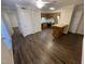 A spacious living area featuring wood floors and a ceiling fan at 3522 Ivy Commons Dr # 101, Raleigh, NC 27606