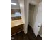 Open pantry and kitchen view features stainless steel appliances at 3522 Ivy Commons Dr # 101, Raleigh, NC 27606