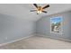 A bedroom with carpet flooring and ceiling fan at 39 Mcguire Ln, Clayton, NC 27527