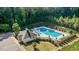 Aerial view of the community pool and surrounding green space at 39 Mcguire Ln, Clayton, NC 27527