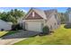 Charming one-story home featuring a two-car garage, well-maintained lawn, and classic siding at 39 Mcguire Ln, Clayton, NC 27527