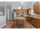 Bright kitchen featuring stainless steel appliances, granite countertops, and a central kitchen island at 39 Mcguire Ln, Clayton, NC 27527