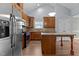 Well-equipped kitchen featuring stainless steel appliances and an eat-in island at 39 Mcguire Ln, Clayton, NC 27527