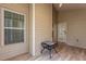 A covered patio with windows and table at 39 Mcguire Ln, Clayton, NC 27527