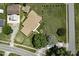 Aerial shot highlighting the property's mature trees and spacious lawn, offering a serene and private setting at 403 E Mcpherson Dr, Mebane, NC 27302