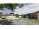 Large backyard with a shed, garage, and driveway, offering ample space for vehicles and outdoor equipment at 403 E Mcpherson Dr, Mebane, NC 27302