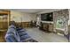 Inviting living room featuring a large TV and comfortable seating at 403 E Mcpherson Dr, Mebane, NC 27302
