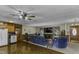 Spacious living room with eat-in-kitchen, ceiling fan, and hardwood floors at 403 E Mcpherson Dr, Mebane, NC 27302