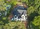 Aerial view of home under construction with stone and painted brick exterior and professional landscaping at 5013 Coronado, Raleigh, NC 27609