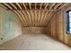 Unfinished attic with exposed wood framework, and newly installed subfloor offers customization potential at 5013 Coronado, Raleigh, NC 27609