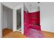Bathroom remodel featuring an open design with vibrant red waterproofing at 5013 Coronado, Raleigh, NC 27609