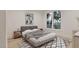 Cozy bedroom featuring a modern bed, stylish decor, and large window with a view at 5013 Coronado, Raleigh, NC 27609