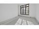 New bedroom with fresh white walls and a large window, creating a light and airy ambiance at 5013 Coronado, Raleigh, NC 27609