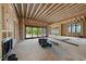 Spacious unfinished living room with wooden framing and large windows overlooking the backyard at 5013 Coronado, Raleigh, NC 27609