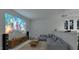 Modern living room features a projector screen, comfortable seating, and sleek entertainment center at 5013 Coronado, Raleigh, NC 27609