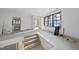 Spacious living room with large windows offering abundant natural light at 5013 Coronado, Raleigh, NC 27609