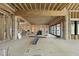 Unfinished main room showcases the open floor plan and large slider to be completed at 5013 Coronado, Raleigh, NC 27609