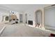 Open floor plan with staircase, arched doorways, fireplace and modern design at 5013 Coronado, Raleigh, NC 27609