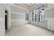 Large room with several windows showcasing the drywall at 5013 Coronado, Raleigh, NC 27609