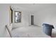 Bright room featuring a large window and a white door at 5013 Coronado, Raleigh, NC 27609