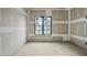 Bright room filled with natural light, showcasing the drywall at 5013 Coronado, Raleigh, NC 27609