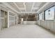 Large unfinished room features drywall and natural light at 5013 Coronado, Raleigh, NC 27609