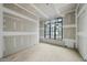 Spacious room with large window and drywall in progress at 5013 Coronado, Raleigh, NC 27609