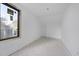 Bright room featuring a large window with a modern design at 5013 Coronado, Raleigh, NC 27609