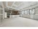 Open layout with an unfinished room showcasing drywall at 5013 Coronado, Raleigh, NC 27609