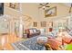 Bright living room with staircase and adjacent spaces at 5405 Bluet Ct, Holly Springs, NC 27540