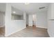 Open-concept living room featuring neutral walls, modern flooring, and natural light at 5408 Gunnette Dr, Raleigh, NC 27610