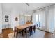 Dining area with table, chairs, modern lighting, and balcony access at 620 Wade Ave # 505, Raleigh, NC 27605